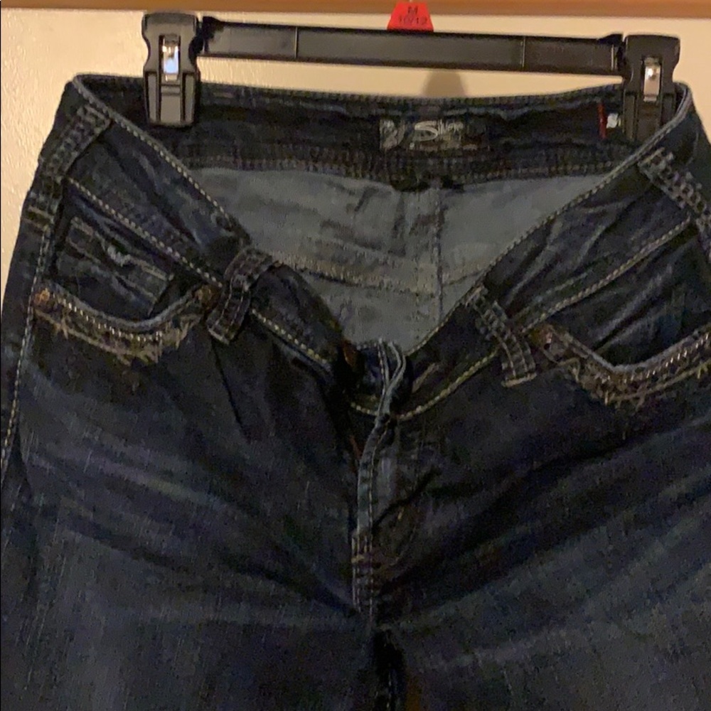 Silver suki jeans slight damage to the bottom